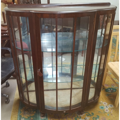 637 - A 1930's oak display cabinet with double leaded glass doors, height 39