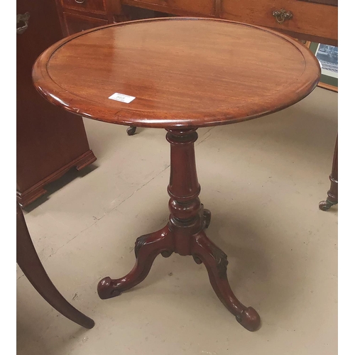565 - A Victorian mahogany occasional table with mahogany dish top, on turned column and triple splay feet