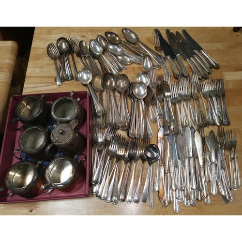 290 - A large quantity of silver plated cutlery including an extensive selection of fiddle pattern mostly ... 