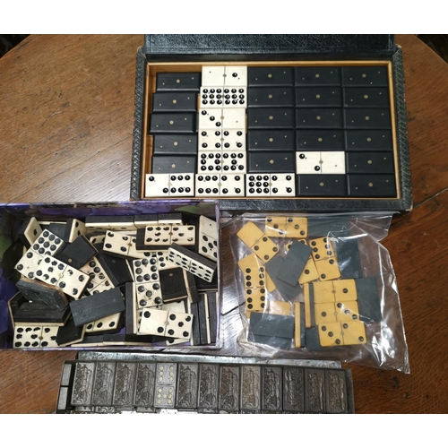 384 - A selection of bone and ebony dominoes; others similar