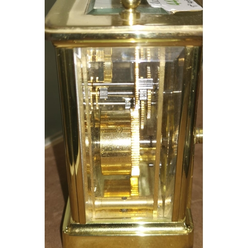 444 - A modern brass carriage clock by Worcester