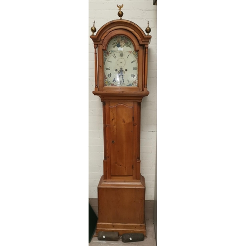 578 - A 19th Century longcase clock, arch top hood with turned pillars and brass finials, quarter reeded c... 