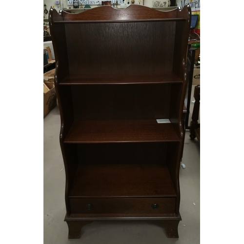 583 - A mahogany reproduction 4 height bookcase with base drawers