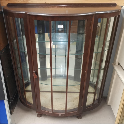 617 - A mid-20th century walnut demi-lune china cabinet enclosed by single door