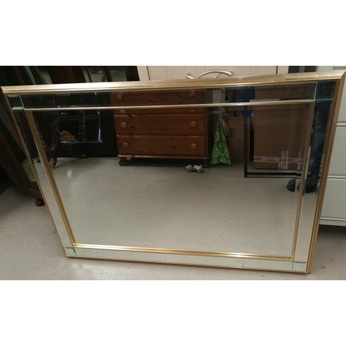 644 - A large gilt framed mirror with glass strip decoration