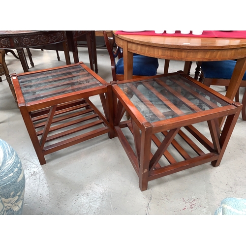 528 - A pair of modern occasional tables with glass tops and slatted undershelves