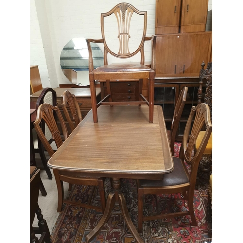 565 - A mahogany period style dining suite with rectangular extending table and 5 Hepplewhite style chairs... 