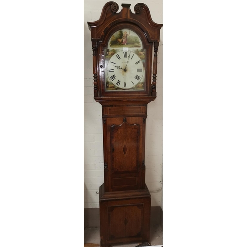 603 - An early 19th century longcase clock in inlaid crossbanded oak, the hood with swan neck pediment and... 