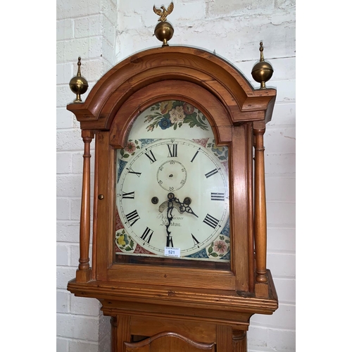 590 - A 19th Century longcase clock, arch top hood with turned pillars and brass finials, quarter reeded c... 