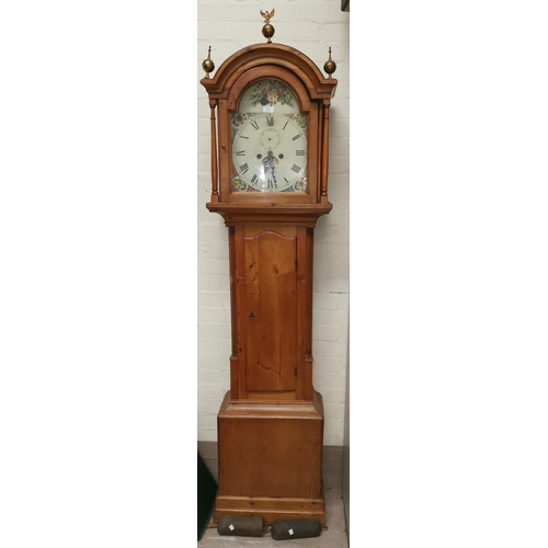 590 - A 19th Century longcase clock, arch top hood with turned pillars and brass finials, quarter reeded c... 