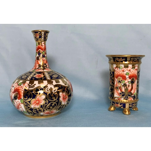 244 - A Royal Crown Derby squat vase with slender neck, height 4