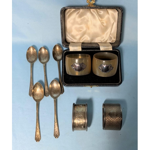 328 - Two silver napkin rings; 5 golf spoons, 3.5 oz total weight; a pair of horn napkin rings