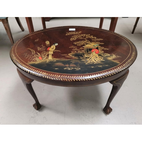 568 - A 1930's walnut occasional table with gilt and colour enamel chinoiserie decoration, 27