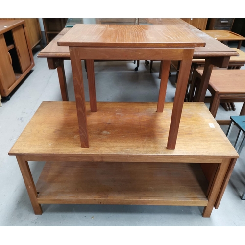 574 - A 1960's teak nest of tables comprising 2 tier coffee table and 2 slide out tables