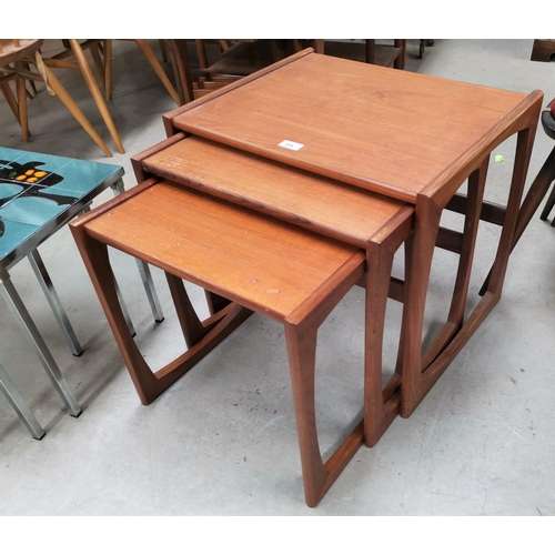 595 - A G-Plan style nest of 3 teak occasional tables