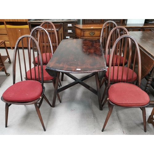 596 - A set of 6 Ercol tall hoop and stick back chairs; an Ercol drop flap table