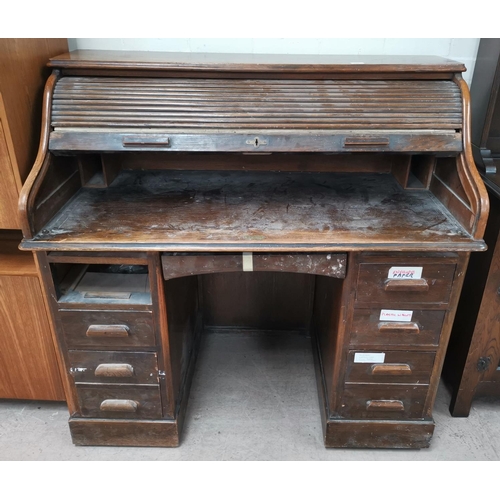 597 - An 'S' roll top twin pedestal desk, vintage oak finish, 48