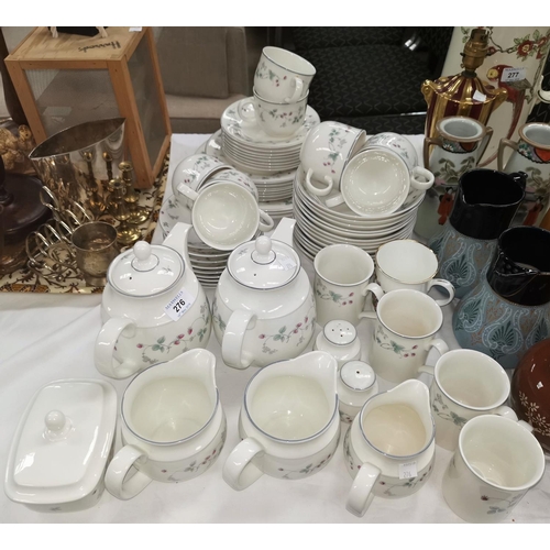 276 - A Royal Doulton part dinner and tea service:  