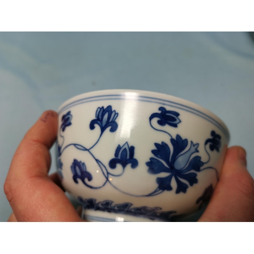 232 - A 20th century Chinese bulbous blue & white vase decorated with a landscape scene, 6 character mark ... 