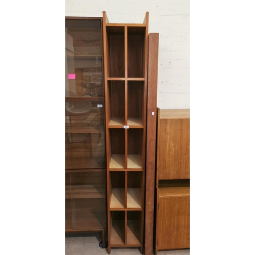 582 - A 1960's teak full height storage unit with 10 shelves