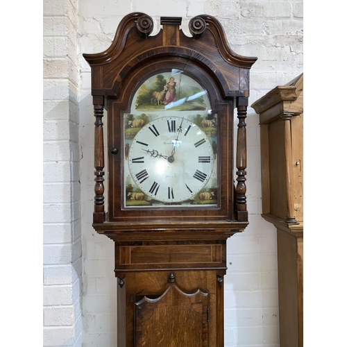 603 - An early 19th century longcase clock in inlaid crossbanded oak, the hood with swan neck pediment and... 