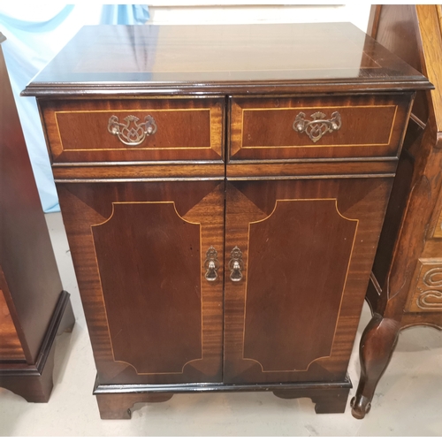 608 - A reproduction mahogany cabinet with hinged lid and double doors