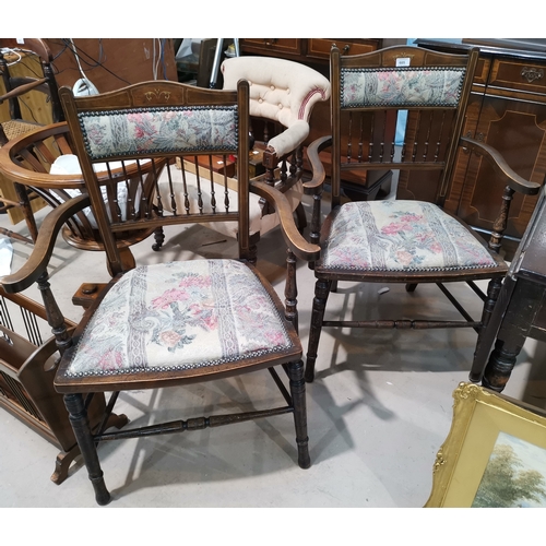 605 - A pair of Edwardian inlaid spindle back dining chairs