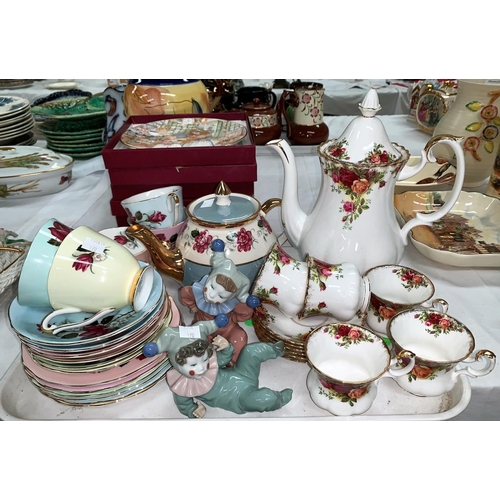 170 - A Royal Albert Country Roses tea pot and six cups and saucers, a Queen Anne part service and two sma... 