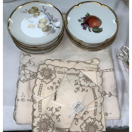 180 - Two Bavarian sets of 6 pottery dessert plates; a Madera table cloth and napkins