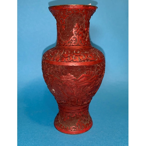 248 - A 19th century Chinese cinabar lacquer baluster vase with relief decoration (lacquer chip to rim and... 