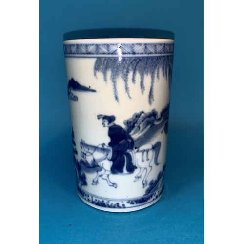 251 - A cylindrical Chinese blue and white brush pot finely painted with figure on horse back in landscape... 