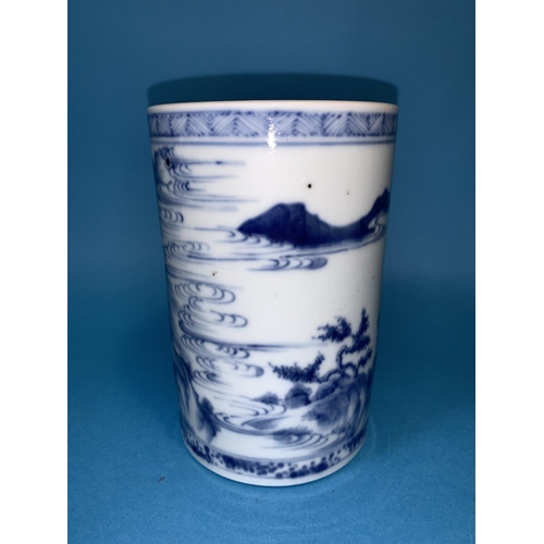 251 - A cylindrical Chinese blue and white brush pot finely painted with figure on horse back in landscape... 