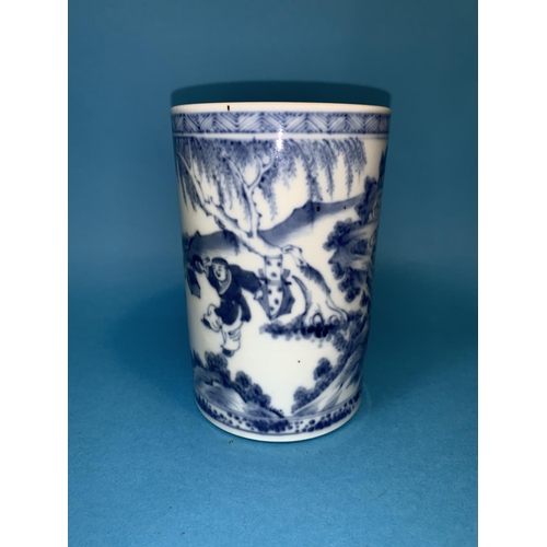 251 - A cylindrical Chinese blue and white brush pot finely painted with figure on horse back in landscape... 