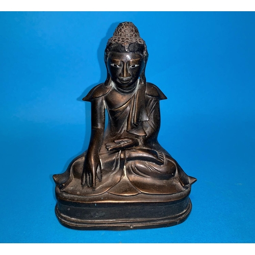 258 - A Burmese bronze seated budda with glass eyes height 6.5