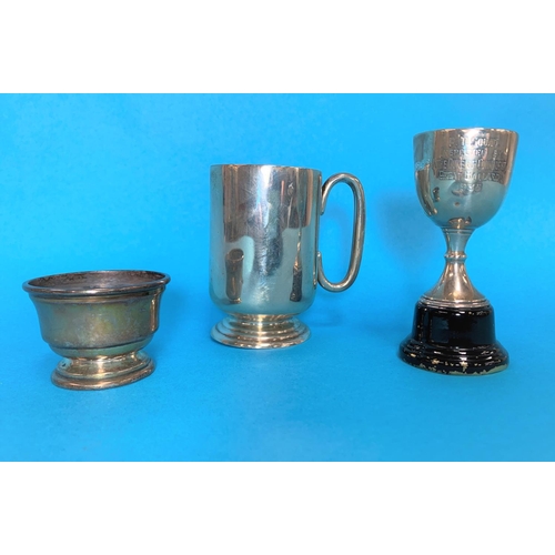 302 - A silver christening cup, Birmingham 1919; a silver salt, 4.3 oz total; a small silver cup presented... 