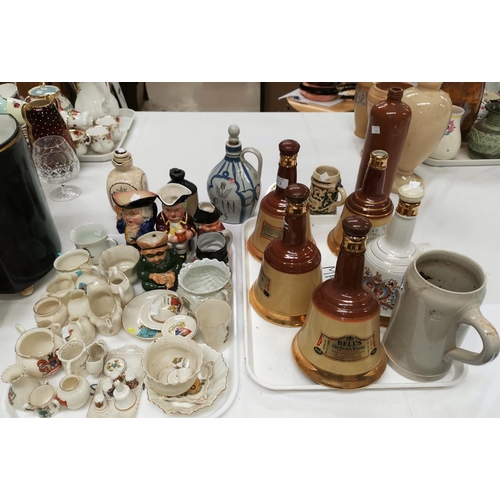 173 - A selection of Wade whisky decanters; other spirit containers; a selection of toby jugs; crested chi... 