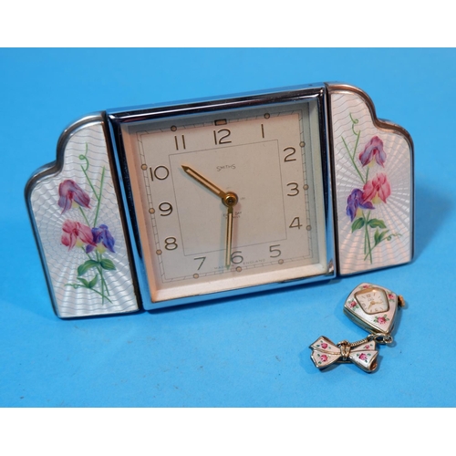 195A - A 1930's Smiths dressing table clock with square chrome framed central clock flanked on either side ... 