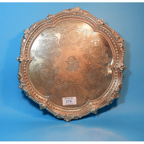 378 - A silver circular salver with beaded shell and acanthus border and chased floral decoration, 3 ball ... 