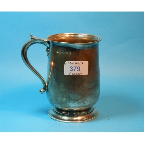 379 - A silver baluster 1 pint mug on circular foot, monogrammed, Birmingham 1946, 11.5 oz