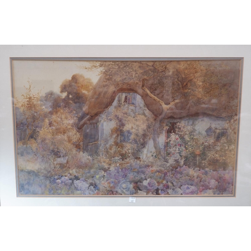 521A - Richard Wane:  watercolour of a country thatched cottage and garden, signed, 15
