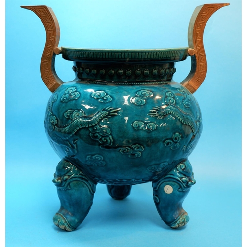 228 - An 18th / 19th century Chinese incense burner, turquoise glazed with raised gilt handles, releif dec... 