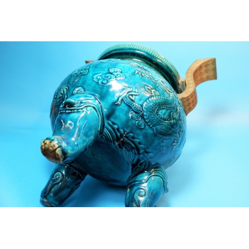 228 - An 18th / 19th century Chinese incense burner, turquoise glazed with raised gilt handles, releif dec... 