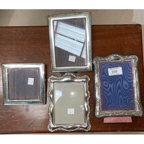 308 - A silver Victorian style photo frame; 3 silver plated photo frames