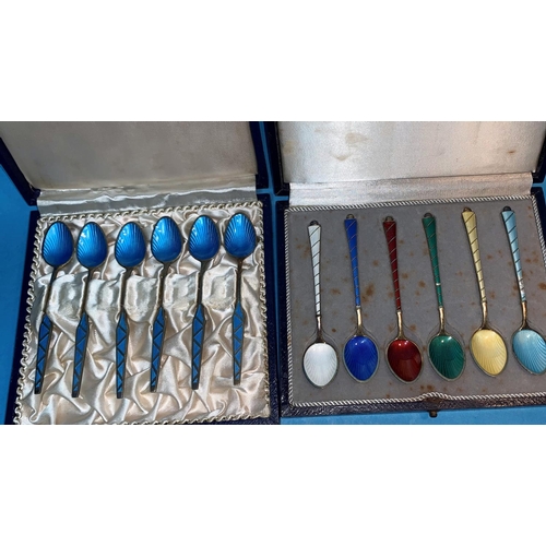 310A - A set of 6 Danish colour enamelled silver gilt coffee spoons, import marks;  a similar set and a pai... 