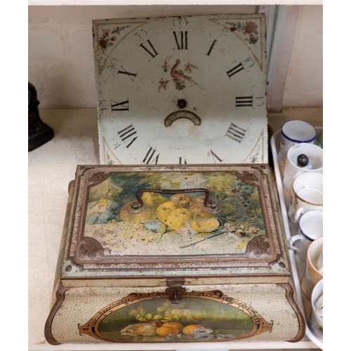 518A - A 30 hour longcase clock movement with painted dial and a decorative tin