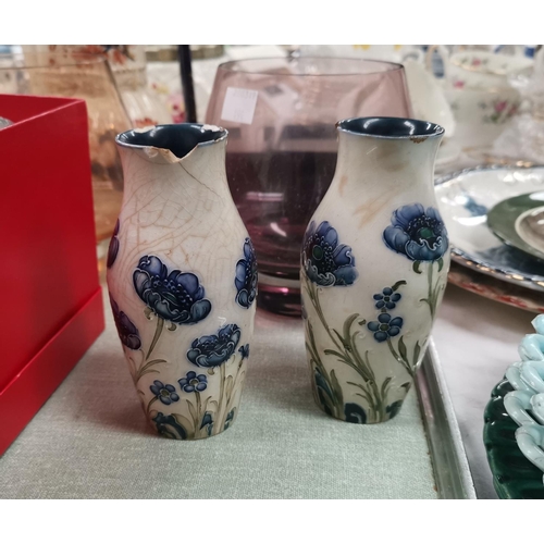 194 - A pair of Moorcroft Macintyre cornflower vases (badly crazed and chipped); 2 Caithness vases; 2 pape... 