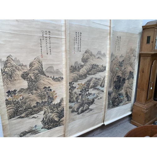 276 - Three early/mid 20th century Chinese scroll pictures depicting figures in landscapes, with Chinese c... 