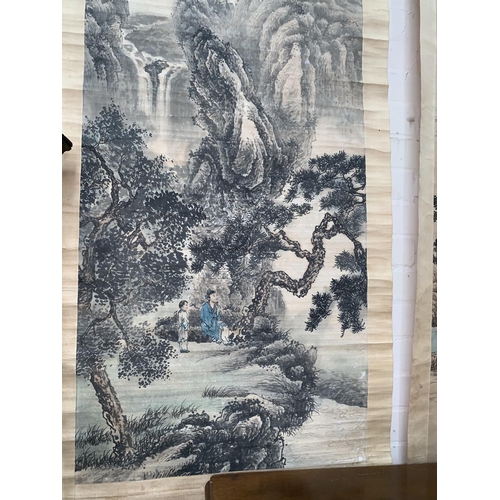 277 - Two early/mid 20th century Chinese scroll pictures depicting figures in landscapes, with Chinese cha... 