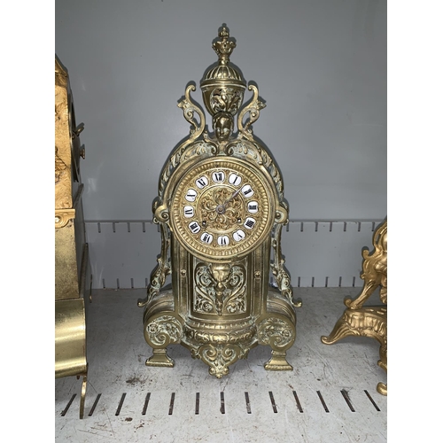 520A - A brass cased late 19th/ early 20th century mantel clock
stamed G.R to movement (glass damaged or mi... 