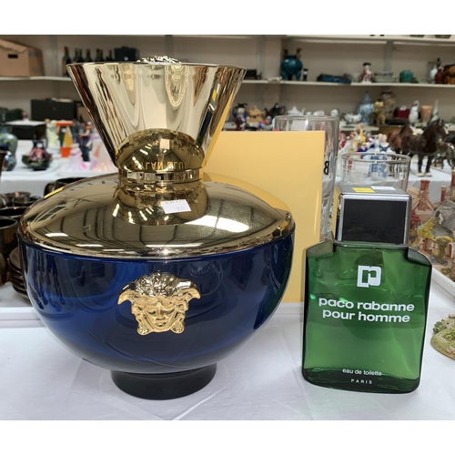 10 - A Versace shop display perfume bottle and a Paco Rabanne perfume bottle
